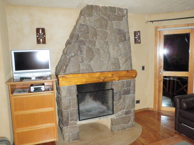 Fireplace in Our Room at Lirolay Suites in Bariloche
