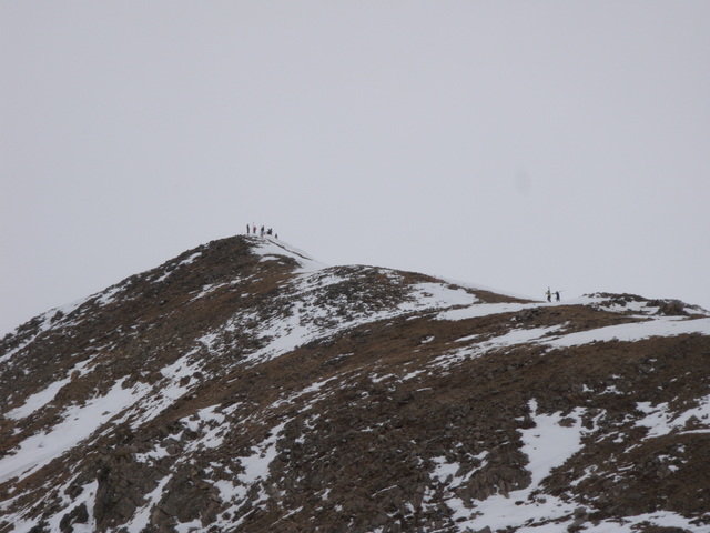 Skiers Hike to the Top of East Wall